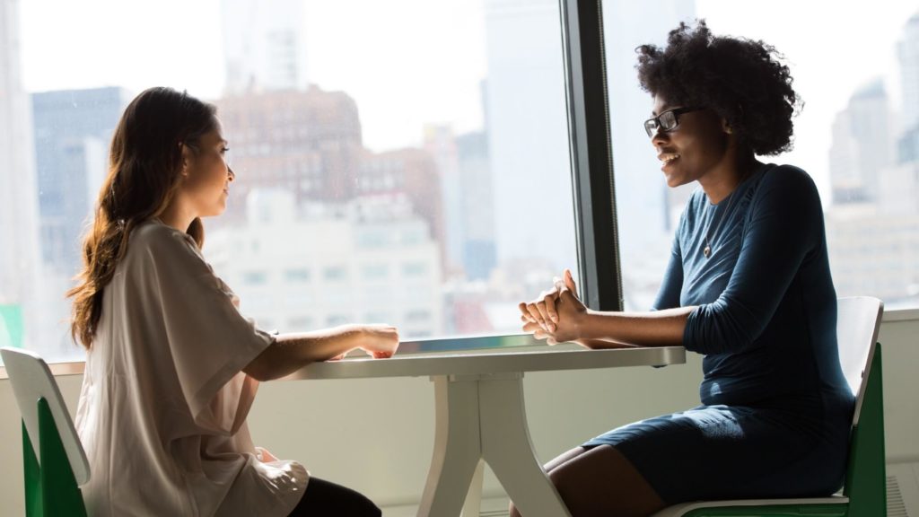 Discussion by two women